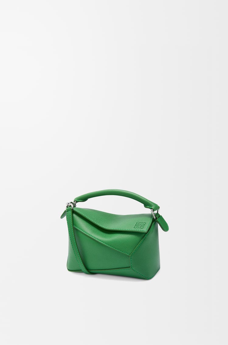 Mini Puzzle bag in soft grained calfskin Green, P219,600, LOEWE, loewe.com